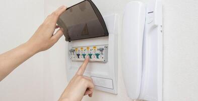 Electrical switchboard with automatic current switches. The concept of security in the apartment against a short circuit. Close-up photo