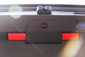 warning triangle in the rear door trim of the car. Close-up, warning photo