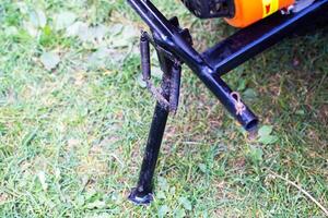 motoblock support for stability on the ground. Copy space for text photo