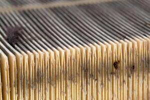 Dirty car air filter texture and background. Air filter element in a car engine, macro, damaged photo