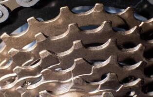 Bicycle stars on a bicycle chain mechanism, background, macro photo
