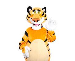 Cheerful teddy orange tiger posing on a white background, isolate. Holiday animator photo
