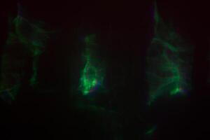 Blurred lens flare. Defocused colorful lights. Shiny glowing spots, abstract background and texture photo