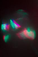 Blurred lens flare. Defocused colorful lights. Shiny glowing spots, abstract background and texture photo