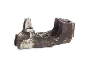 Aluminum pad and car engine mount, close-up. Engine cushion shock absorbing vibration on a white background, isolate photo