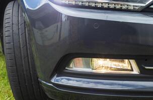 Fog lamp for adaptive illumination of the roadside in the dark when turning the steering wheel. Close-up, technology photo