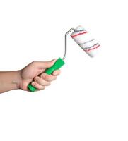 Construction roller for painting in a man's hand on a white background, isolate. Close-up, professional photo
