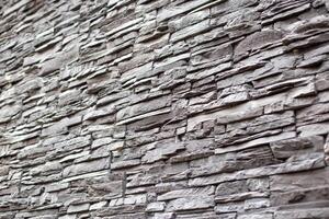 Texture and background of gray stone wall, modern building decoration, architecture photo
