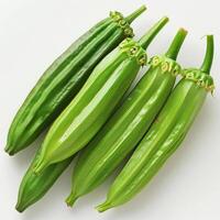 A bunch of unripe green cucumbers photo