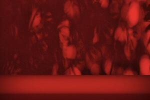 Stucco Table with Bokeh Light and Shadow of Christmas Trees in the Christmas Red Tone photo
