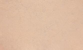 Background from a beige wall, background for graphic design, background for inscriptions photo