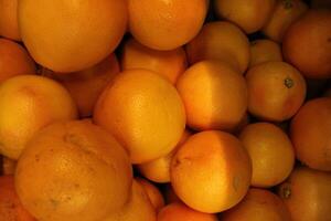 Close-up orange grapefruit. Background of fruits. Tropical Exotic Fruits photo