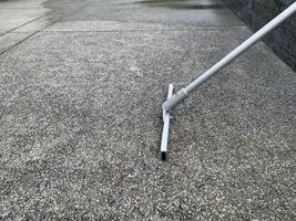 water mop equipment on floor background photo