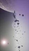 a large cluster of asteroids near an unknown planet, vertical video