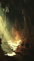 A cave filled with lots of rocks and water video
