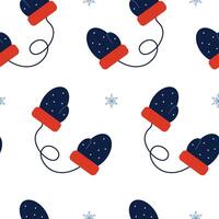 Winter mittens pattern with snowflakes on a white background vector