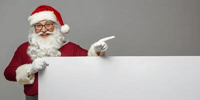 A smiling Santa Claus joyfully holds a blank sign in front of him, ready for a personalized message, spreading festive cheer and holiday spirit. photo