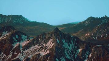 A group of mountains with snow on them video