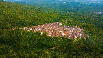 In Pandeglang, Banten, a charming village nestles at the foot of Mount Pandeglang, forming a picturesque triangle. photo