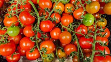 Tomatoes background. Tomatoes on the counter in the store. Vegetables photo