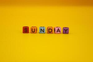 yellow background with the words sunday photo