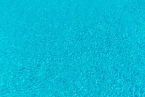 The smooth water in the pool as a background photo