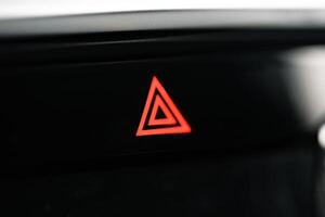 Emergency button in a luxury car close up photo