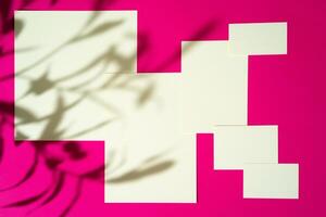 Mock-up on pink background. Businesscards with copy space photo