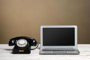 Workplace with modern desktop laptop photo