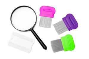 A magnifying glass and lice comb placed side by side on a clean white background photo