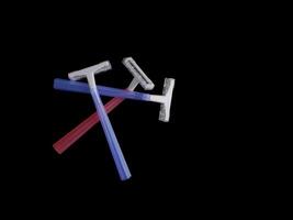 Razors for removing body hair isolated on black background with copy space photo
