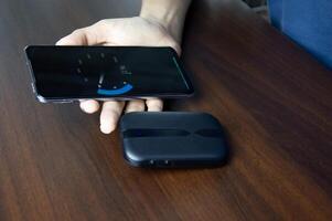 The concept of connecting to the internet with Pocket Wifi devices, wireless connection photo