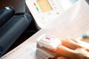Concept of blood oxygen level measurement, abnormal heart function detection, annual health check-up photo