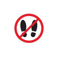 Boot foot print crossed in red circle vector