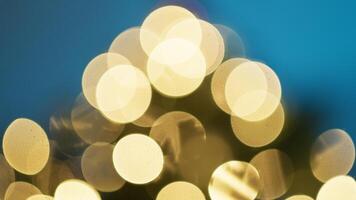 Blurred Christmas lights on blue background photo