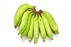 Bananas that are still green white background photo