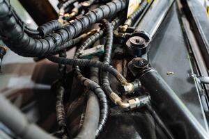 a close up of a hydraulic system on a vehicle photo