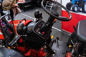 Detailed view of tractors steering wheel, a key automotive design element photo