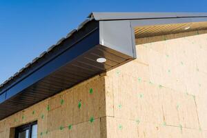 A house with a roof made of wood and insulation photo
