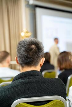 The Audience Gathered to Attend a Presentation at a Conference Setting, Engaging in Dynamic Learning and Discussion Opportunities photo