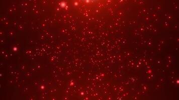 Abstract luxury red background made of flying and shiny particles.Flight of bright dots, bokeh awards dust video
