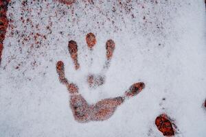 A handprint in the snow photo