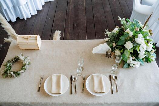 A table set with white plates and silverware photo
