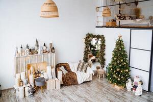 Interior shot. Fireplace, decorated Christmas tree with hidden gifts, cosy room, preparations for the new year Modern apartment. christmas and New year photo