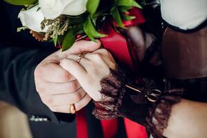 Close-up of a woman and a man holding out their hands, two people holding hands. The symbol is a sign of sincere feelings, a loved one. the concept of true friendship, outdoors photo