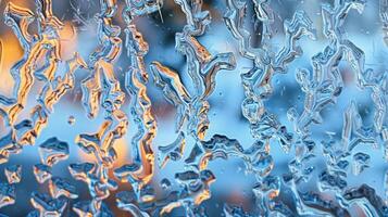 Abstract texture of frozen water droplets on glass, with blurred colorful background. photo
