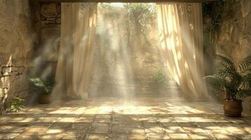 Sunlight streams through white curtains in a stone room with potted plants. photo