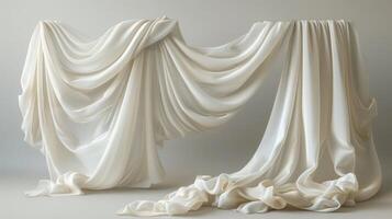 White fabric drapes and folds create a beautiful and elegant backdrop. photo