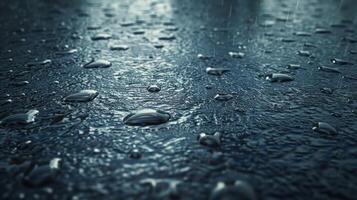 Close-up of raindrops on a wet surface. photo