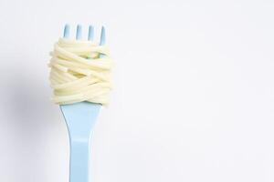 Spaghetti wrapped around a fork photo
